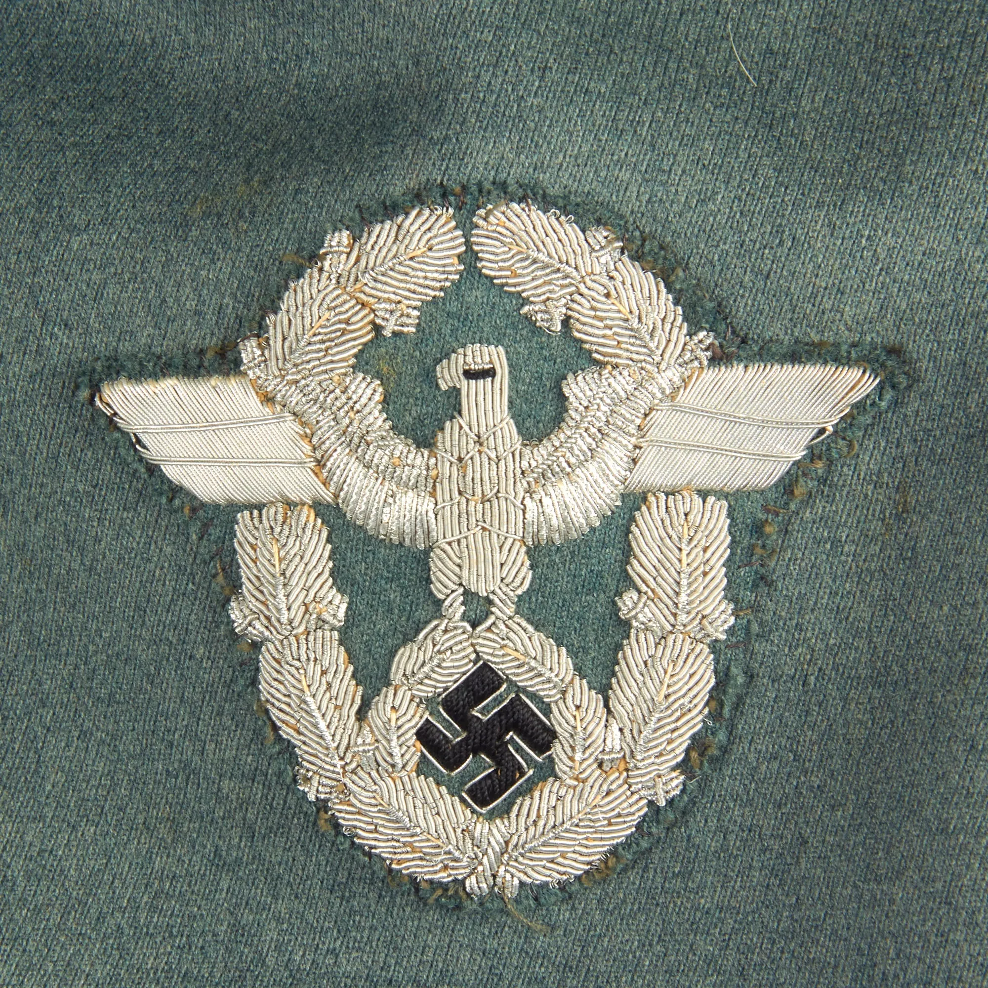 Original German WWII Named Oberleutnant der Schutzpolizei Officer's M36 Field Tunic with WWI Era Medal Bar - dated 1939